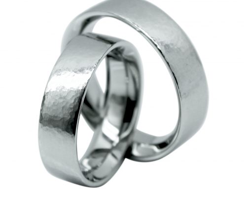 Platinum Wedding Rings with small hammered surface texture by William Cheshire London Jeweller