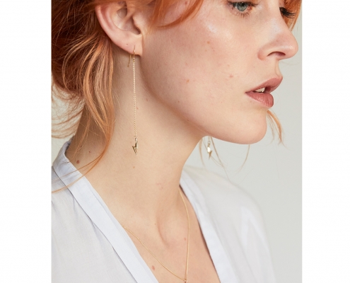 Lightning bolt earrings on chains and wires model on Eva by William Cheshire Bespoke and Cult London Jeweller